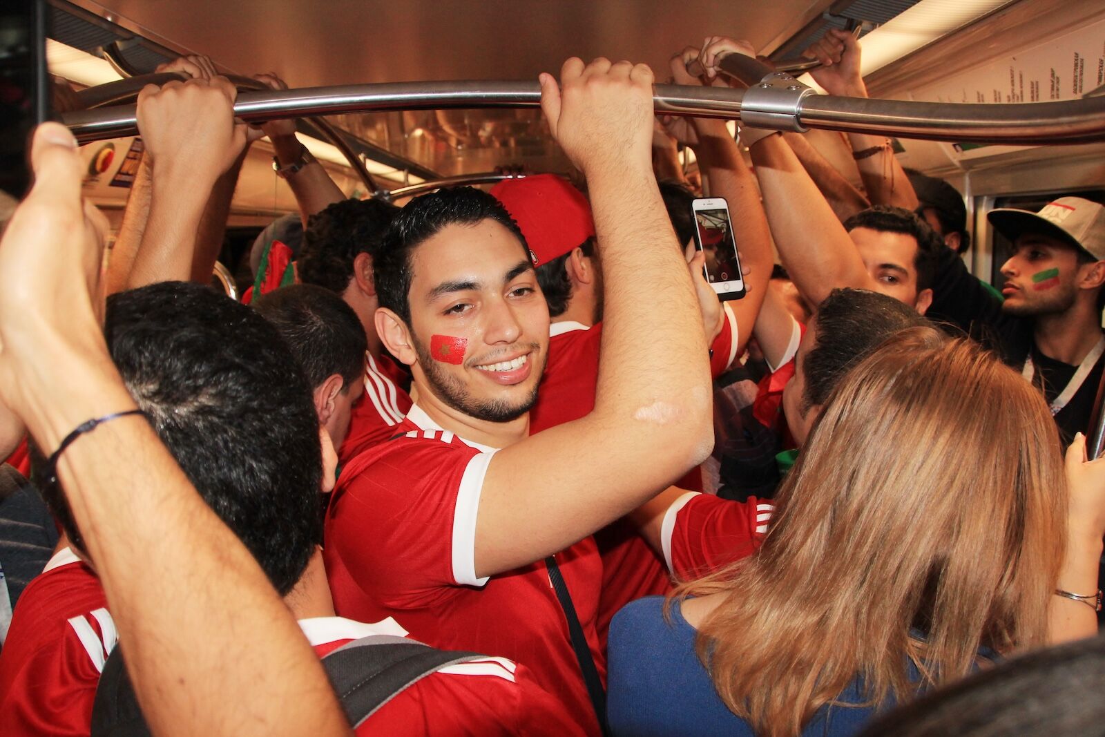 soccer fans on subway