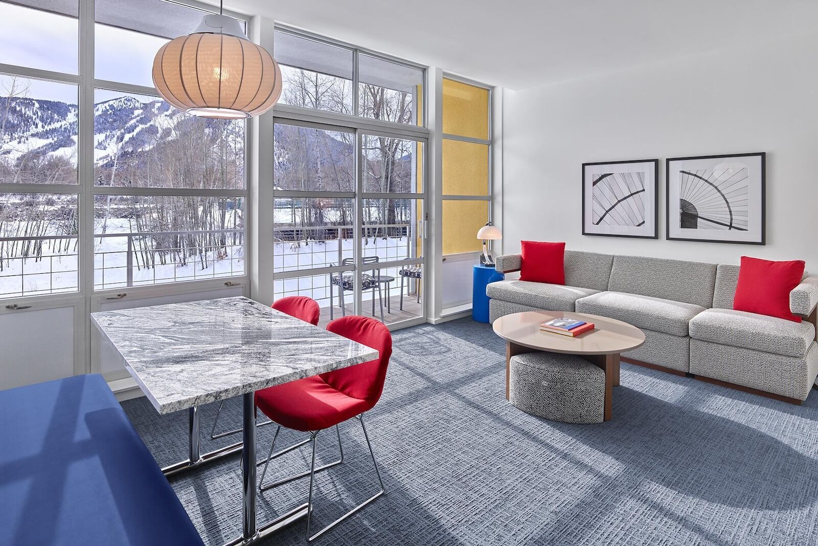 room at aspen meadows resort with snowy mountain behind