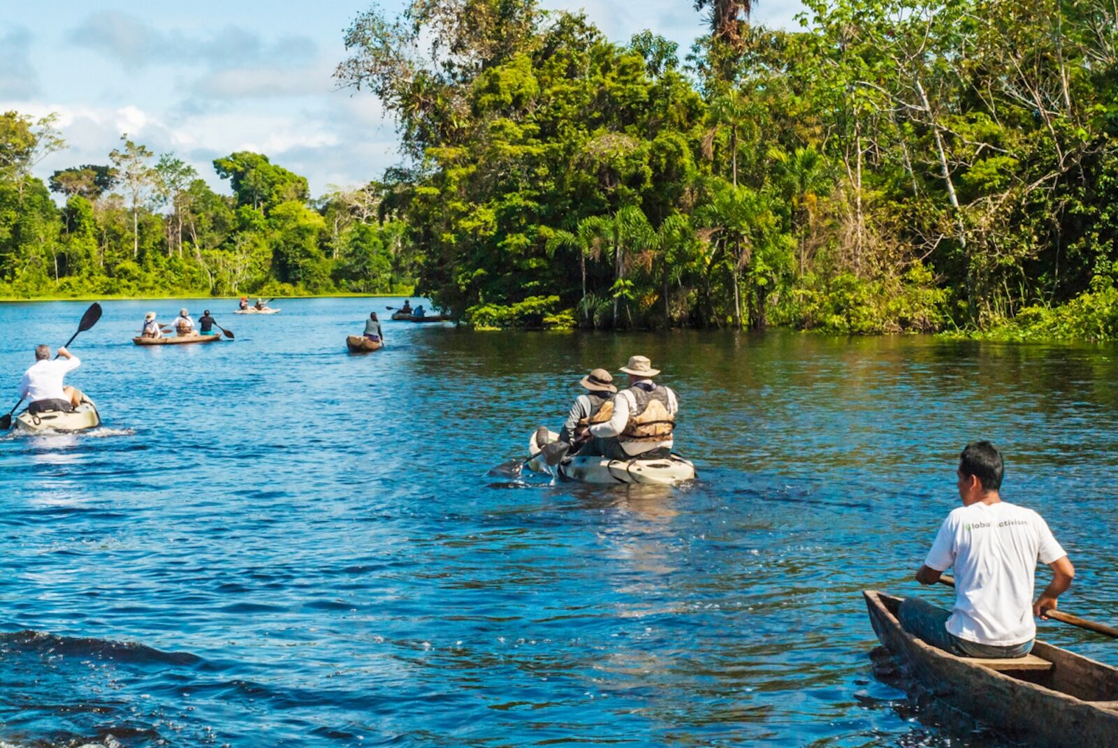dream vacations - amazon river cruise paddling