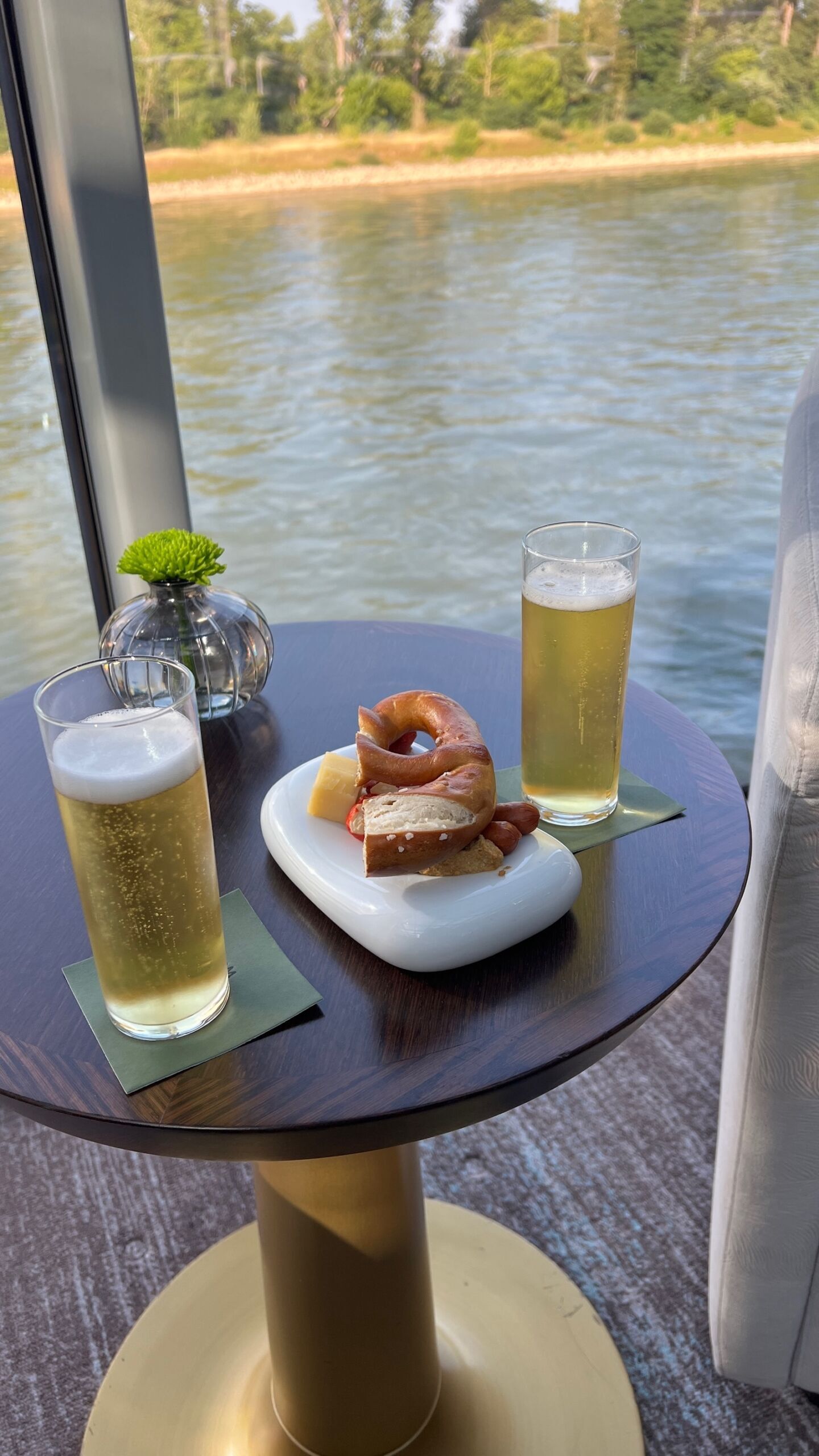 beer and pretzel onboard a riverside luxury cruises hops and heritage sailing