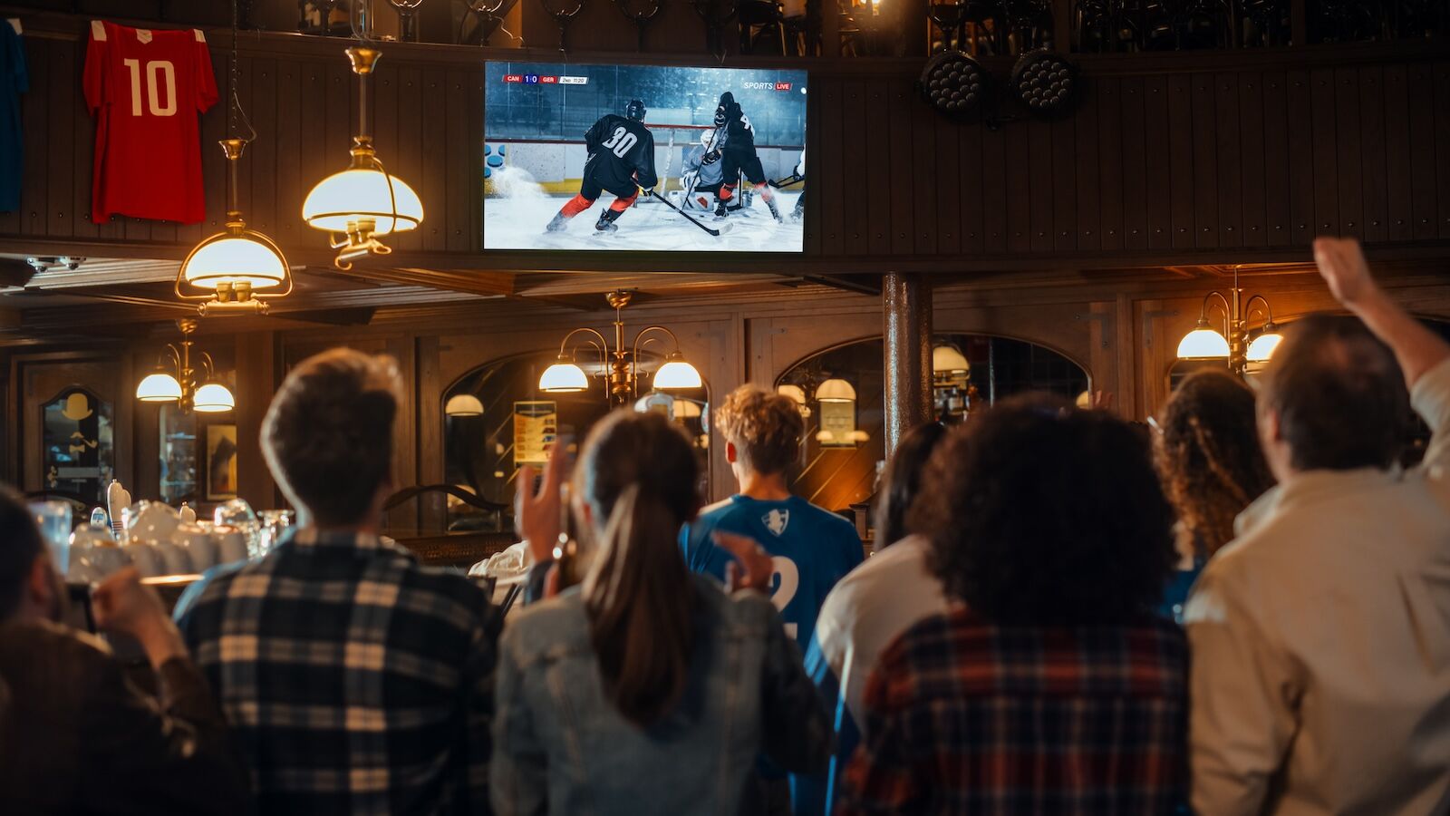 sports travel and spirits - people watching hockey