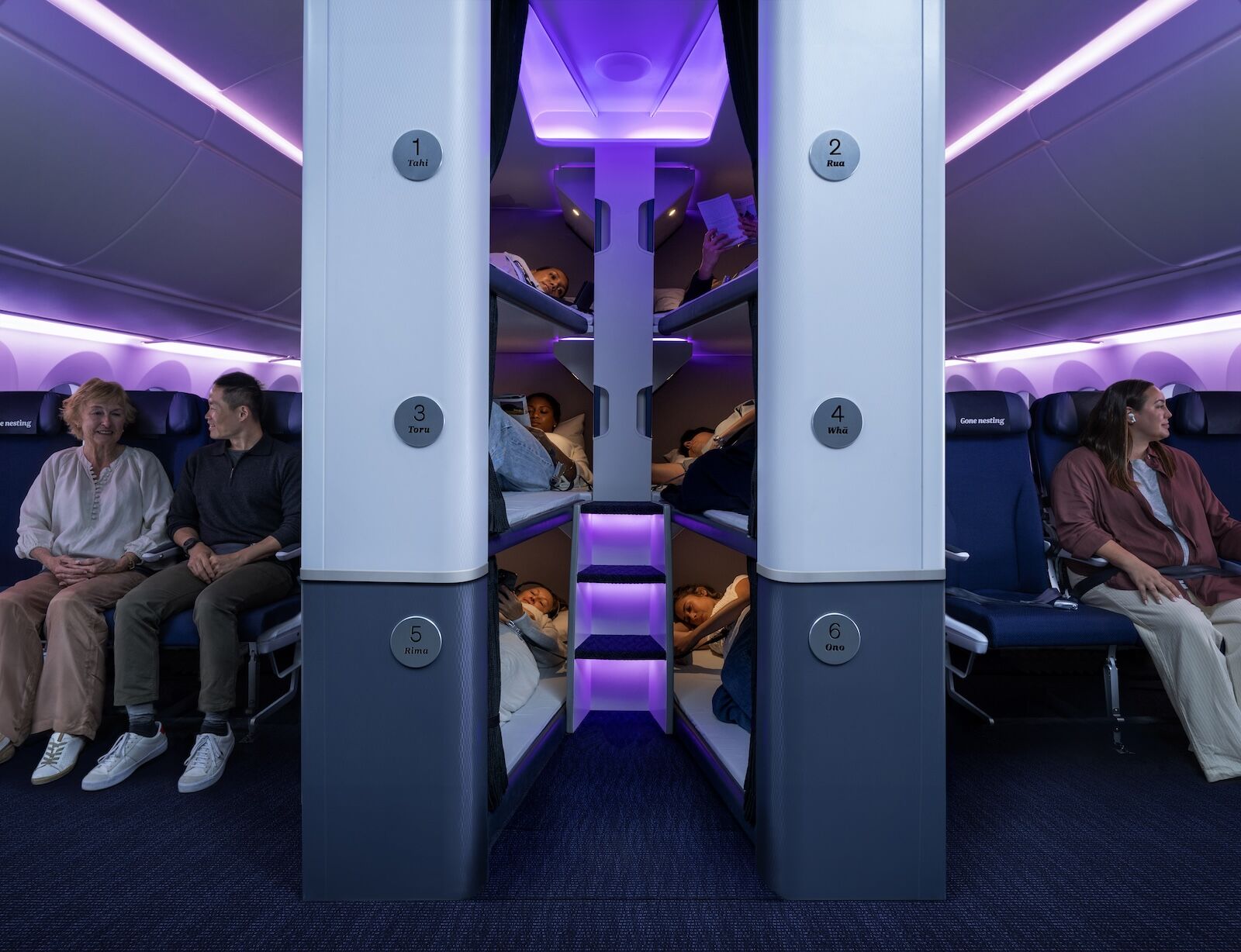 air new zealand skynest - people on plane