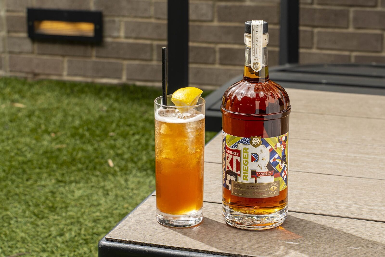 j. rieger whiskey bottle and cocktail