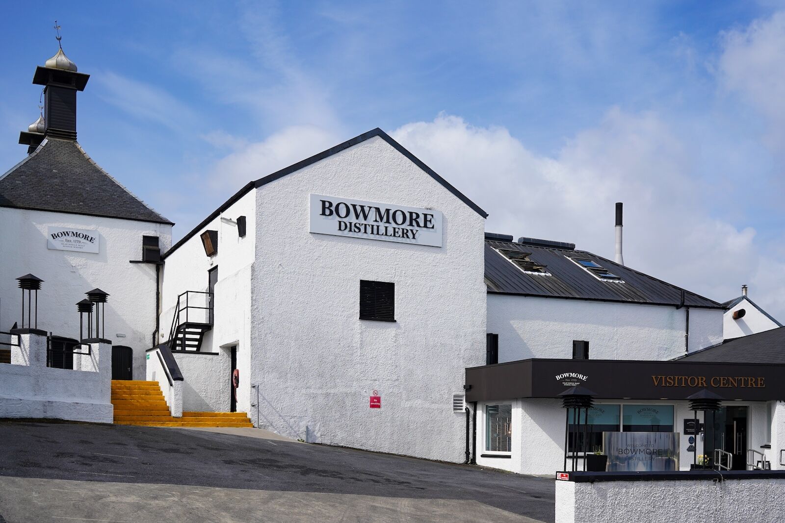 Bowmore, Islay, Scotland - May 14 2022: The Bowmore Scotch whisky distillery on the Isle of Islay. Bowmore is the oldest active distillery on the island.