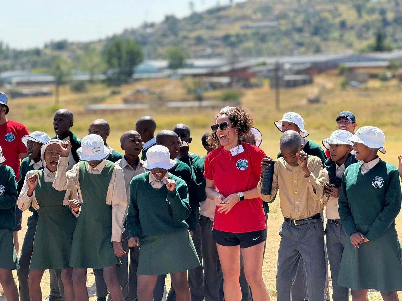 lesotho soccer tour - visitor and kids