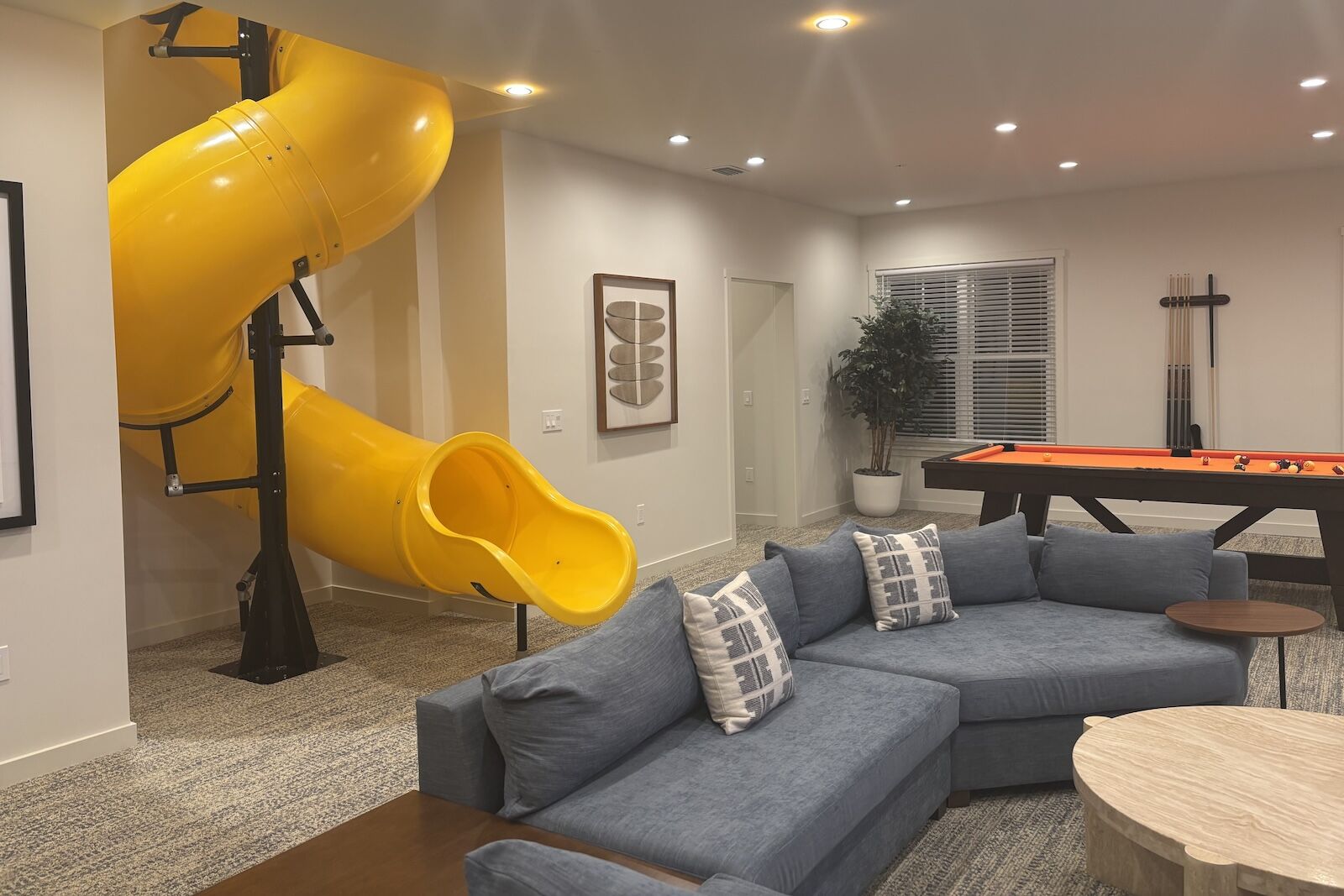 game room and slide in home at evermore orlando resort