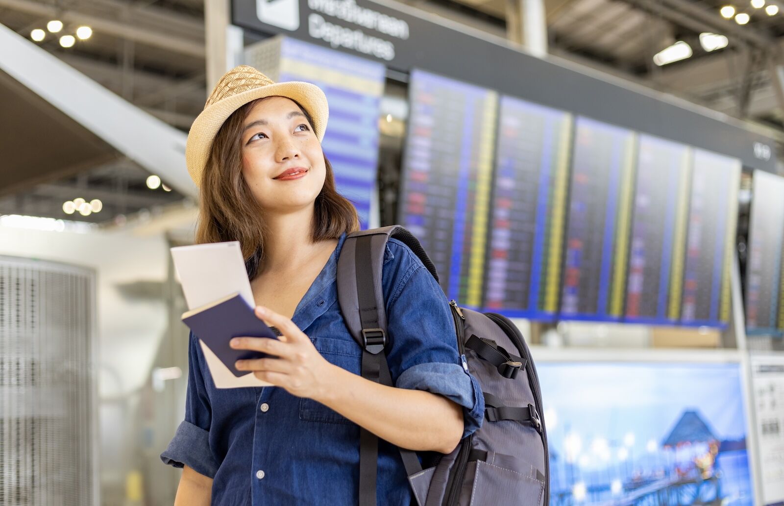 woman at airport with passport