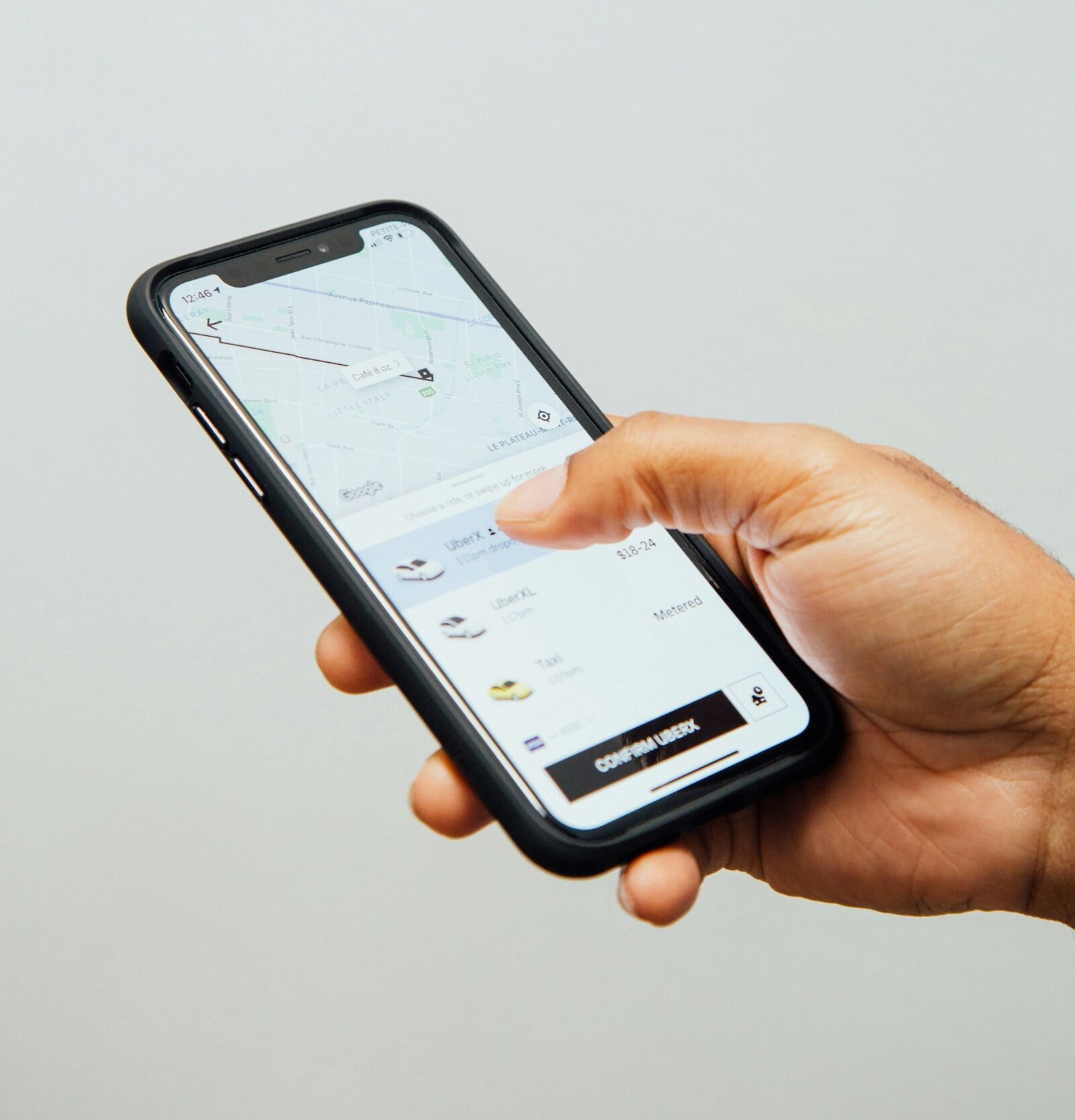 relive past trips - hand holding phone